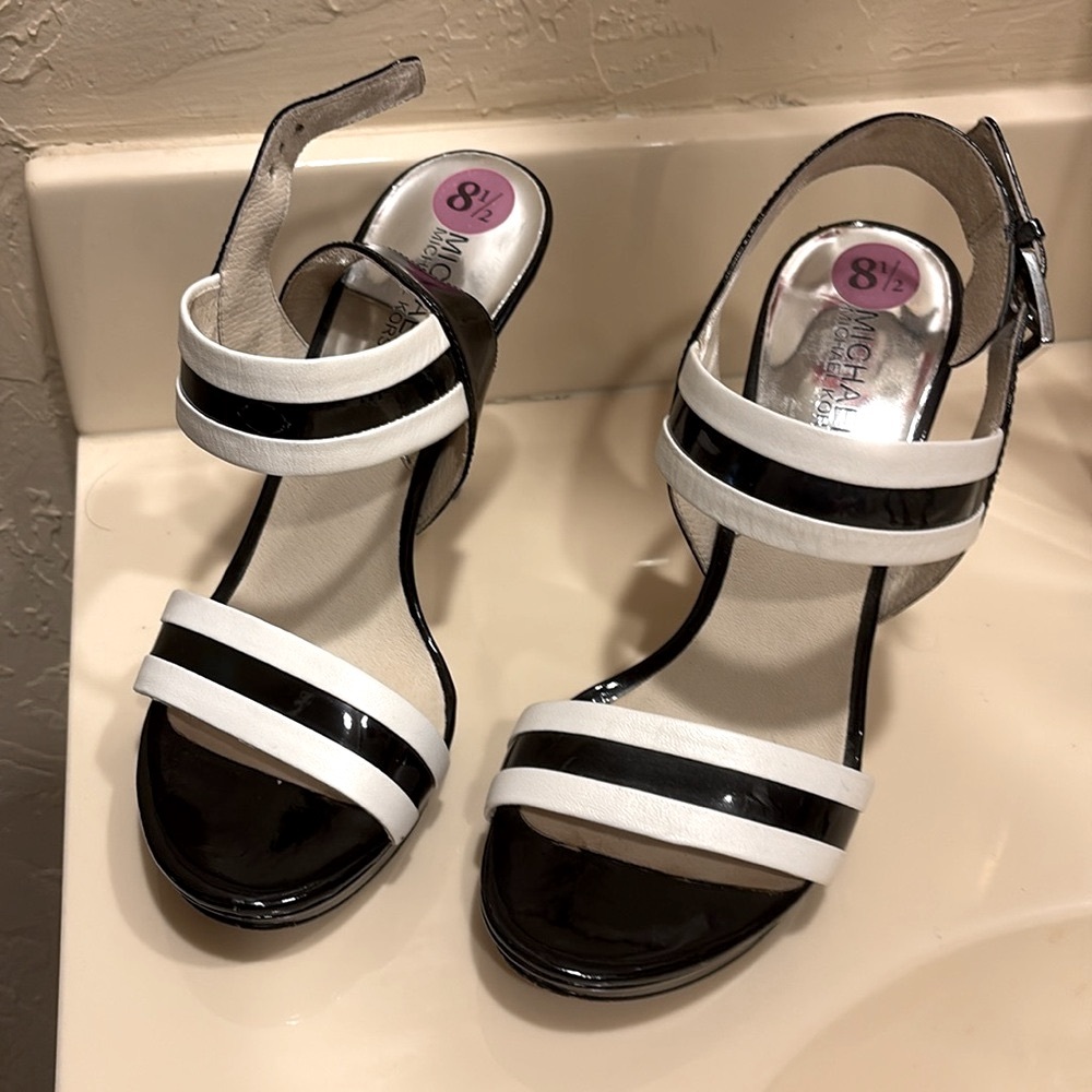 Size 8.5 Black and white Michael Kors 5.5 inch Heels, like new - never worn